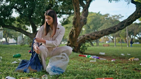 How can you safely store perishable food while camping in the UK?